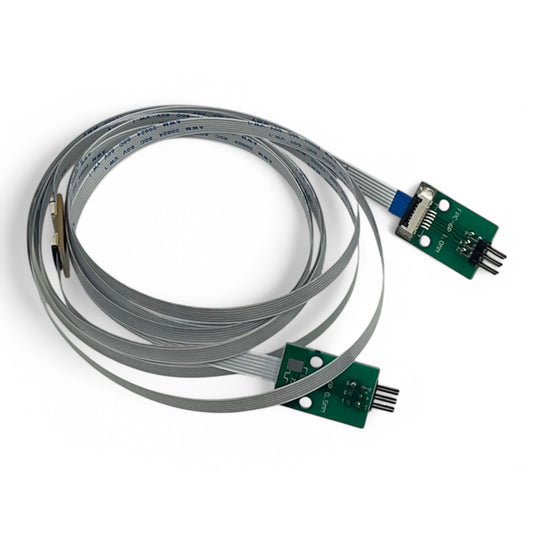 A ribbon cable kit, consisting of a gray cable with connectors at both ends, designed for use with MIRA laser systems.
